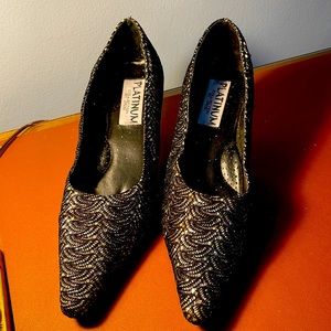 Gently used sequined black pumps
